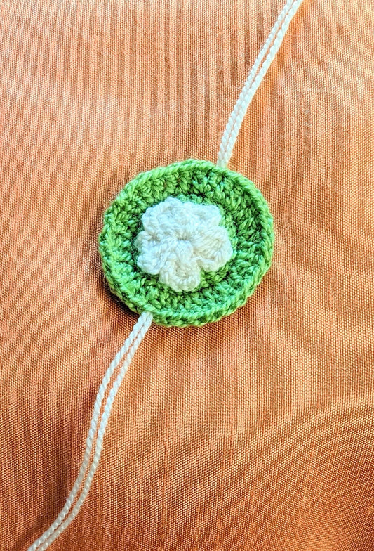 Green and White flower rakhi (minimal set)