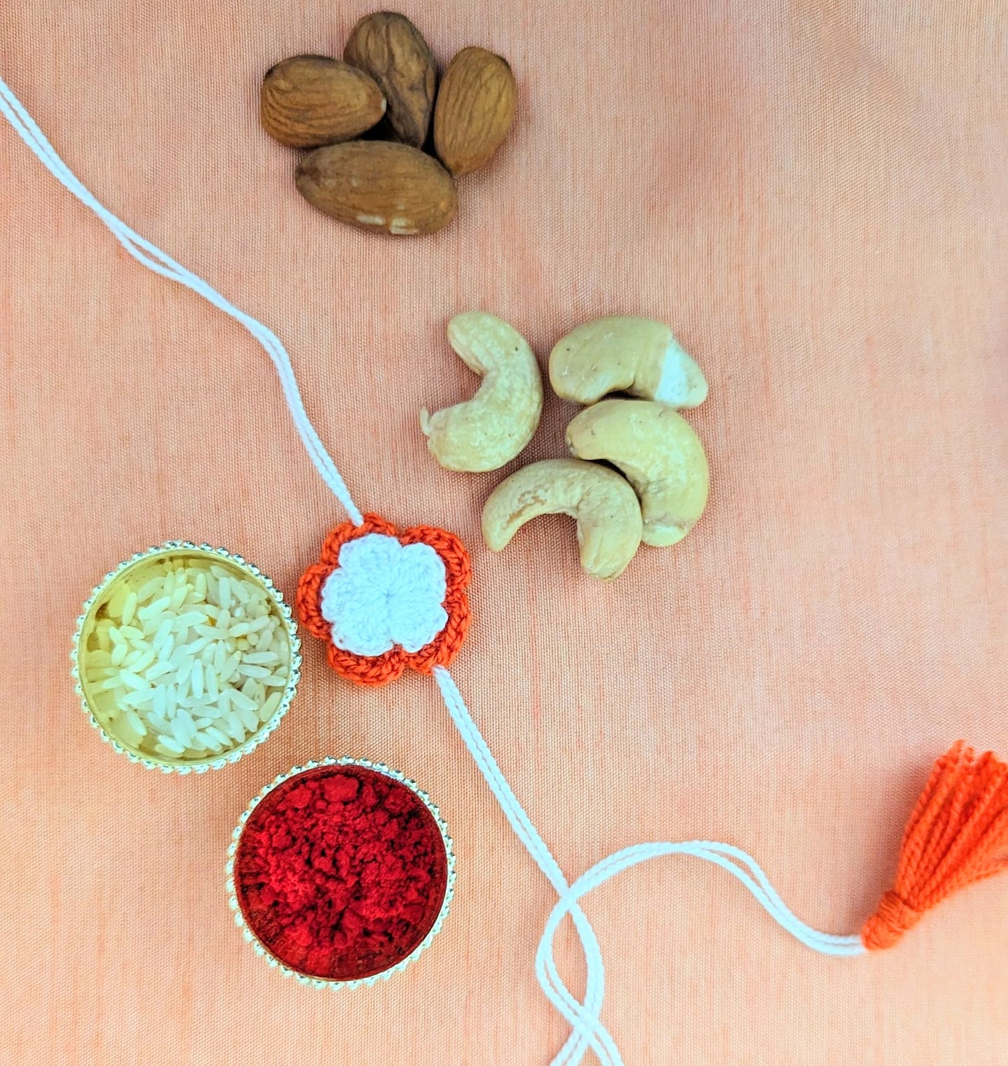 Coral and White flower rakhi (complete set)